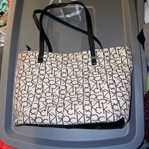 Calvin Klein purse , gently used, wear on bottom shown in last pic